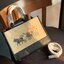COACH LUNAR NEW YEAR DEMPSEY CARRYALL IN SIGNATURE WITH OX AND CARRIAGE((C2181)) 🌈พร้อมส่งทันทีที่ไทย! กระเป๋าหิ้วหรือสะพายข้างได้ หนังแท้นิ่มทรงสวยค่ะ ⭐️ด้านหน้าเด่นด้วยรูปวัววลากรถม้าประดับดาววิ้งๆมาด้วยนะคะ เปิดปิดกระเป๋าแบบกระดุมแม่เหล็ก ภายใน