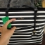 KATE SPADE HYDE LANE STRIPED RILEY LEATHER TOTE BAG กระเป๋าสะพายทรง Tote Bag หนังสวยอยู่ทรง โดดเด่นที่สีทูโทนลายทางห้อยโลโก้ TAGcที่หูกระเป๋า ด้านหน้าประดับโลโก้ มี1ช่องใส่ของ ภายในมีช่องซิป และช่องใส่มือถือ กว้างและจุ ใส่ ipad notebook เอกสาร A4 กระเป๋าส