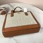TORY BUTCH SMALL WALKER CANVAS กระเป๋าถือ หรือสะพาย TORY BURCH เปิด - ปิดกระเป๋าด้วยกระดุมแม่เหล็ก ด้านในแบ่งเป็น 3 ช่อง มีช่องซิปตรงกลาง และมีช่องซิปเล็กอีก 1 ช่อง ช่องใส่ของ 1 ช่อง หูจับสูง 14 cm มาพร้อมสายสะพายยาว สามารถถอดและปรับได้ Free Size ค่ะ