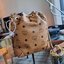 M.C.M SOFT BERLIN DRAWSTRING BAG IN VISETOS กระเป๋าสะพายทรง bucket ไซส์ mini ขนาดน่ารักน่าใช้ มาพร้อมกล่องสุดหรู!! วัสดุหนังแคนวาสคุณภาพดี รูดเปิด-ปิดกระเป๋าด้วยสายหนัง ภายในเป็นช่องโล่ง มีช่องแยก และช่องเก็บบัตรหรือจะไว้ของจุกจิกก็ได้ เป็นหนังแท้ ใ
