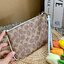 COACH SMALL WRISTLET IN COLORBLOCK SIGNATURE ((32445)) ✔️กระเป๋าคล้องมือ วัสดหนัง pvc อย่างดี ลายซิกเนเจอร์ ตัดขอบสีตรงกลางสวยงามมากๆค่ะ แบบซิปเดียว ((ภายในใส่มือถือได้บางรุ่นค่ะ)) มีช่องเสียบบัตรให้2ช่องด้วยนะคะ
