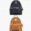 M.C.M STARK STUDS MINI BACKPACK IN VISETOS อีกหนึ่งรุ่น Best seller ที่ต้องมี!! กระเป๋าเป้ ไซส์ mini ขนาดเหมาะกำลังดีกับสาวๆ ที่ไม่ชอบแบกของหนักมาก ตกแต่งหมุดอะไหล่ทองด้านข้าง สวยหรู วัสดุหนังแคนวาสคุณภาพดี เปิด-ปิดด้วยซิป ภายในเป็นหนังแท้ จุของได้พอสมควร