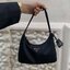 PRADA Nylon Mini Bag รุ่นใหม่แนะนำ!! พร้อมส่งครบ4สี รุ่นขายดีในตำนานค่ะ PRADA NYLON HANDBAGS ขนาดกะทัดรัด **อะไหล่เงิน วัสดุทำจากผ้าNylon อย่างหนา อยู่ทรง กันน้ำได้ หายห่วงคะ ด้านหน้ามีโลโก้แบรนด์ เปิดปิดด้วยซิป มาพร้อมสายผ้า ไม่สามา