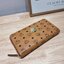 M.C.M ZIP AROUND WALLET WITH LOGO IN VISETOS ดีไซน์ใหม่ล่าสุด กระเป๋าสตางค์ซิปรอบ ไซส์ large คลาสสิค รอบนี้ดีไซน์ใหม่ โลโก้โดดเด่น สุดหรู
