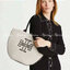 Tory Burch Small Canvas Round Tote กระเป๋าถือหรือสะพายไหล่ วัสดุผ้าcanvas รูปทรงโค้งมน ด้านในโล่ง มี1ช่องซิปและ1ช่องเล็ก น้ำหนักเบา จุของได้เยอะ มาใหม่ล่าสุดไม่ควรพลาดเลยค่า
