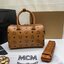M.C.M ESSENTIAL BOSTON BAG IN VISETOS Small 23 Handbag มาพร้อมสายสปอร์ต กระเป๋าถือ/สะพายข้าง ทรงหมอน สวยโดดเด่น ทรงสวยยอดนิยม มาพร้อมพวงหนังห้อย และสายรัดเก็บหูจับ วัสดุหนังแคนวาสคุณภาพดี เปิด-ปิดด้วยซิป ภายในโล่งกว้าง ใส่ของได้เยอะ กระเป๋าสตางค์ โทรศัพท์