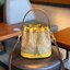 ของแท้ 💯% 】Tory Burch Monogram Jacquard Bucket Bag กระเป๋าถือหรือสะพายไหล่ วัสดุผ้า Canvas โลโก้ Jacquard ทรงถัง ตั้งอยู่ทรง