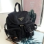 PRADA MINI BACKPACK with chain กระเป๋าเป้ size mini premium gift จากแบรนด์ Prada ขนาดกำละงน่ารัก ปรับสะพายได้หลายทรง วัสดุ nylon เปิดปิดด้วยกระดุมแม่เหล็ก ด้านหน้ามีช่องเล็ก น้ำหนักเบา ภายในมีช่องเล็ก และช่องซิป จุได้เยอะ ซับได้ 100& polyester มีหูหิ้วจับ