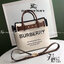 BURBERRY FRAGRANCES TOTE BAG อีกหนึ่งไอเท็มหายาก วัสดุ Canvas & Leather Calfskin ดีไซน์สวยมีเอกลักษณ์คาดด้วยสายหนังประดับกระดุมทองด้านหน้า หูจับหนังแท้จับถนัดมือ สายสะพายยาวหนังแท้ถอดได้ปรับระดับได้อะไหล่แบรนด์ ภายในโล่งกว้างมีช่องใส่ของใส่เอกสารA4 กระเป๋