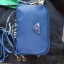 Prada 3 zipper mini crossbody bag งาน premium gift จาก counter ต่างประเทศค่ะ วัสดุ ผ้า nylon ตามแบบฉบับของแบรนด์เลย มาพร้อมกับสาย 2 เส้น มีสายหนังคล้องข้อมมือ และสายยาวสำหรับสะพายไหล่ หรือ crossbody ค่ะ ขนาดกำลังน่ารัก อะไหล่ทองดูหรู ภายใน มีช่องซิปแบ่ง 3