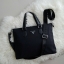 PRADA VIP GIFT NYLON HANDBAG ทรงสวย สุดคลาสสิค อยู่ทรง สวยหรูมากคะ วัสดุทำจากNylon คุณภาพดีสามารถกันน้ำได้ จะถือก็หรู จะสะพายก็ได้คะ ขนาดกลางๆ จุของได้เยอะ ใส่สมุด หนังสือ Ipad Labtop ได้สบายๆคะ ใช้ได้ทั้งคุณผู้หญิง และ คุณผู้ชายเลยคะ ดูดีมีคลาส มากๆคะ รุ