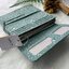 กระเป๋าสตางค์ยาว 3 พับตอน Kipling Brownie long tri-fold wallets กระเป๋าสตางค์ยาวแบบ3พับตอน วัสดุกันน้ำ เปิดปิดด้วยกระดุมแป๊ก มีช่องใส่ธนบัตรหลายช่อง ช่องเสียบการด์ได้ถึง13ช่องลายจุด และใส่รูปภาพได้อีก2ช่อง ช่องซิปใส่เหรียญ ช่องธนบัตร 3 ช่อง ที่จับหัวซิปปั