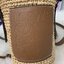 Loewe Bucket Bag / Loewe raffia and hemp bucket bag วัสดุ Textile Canvas & CalfSkin เป็นการนำวัสดุธรรมชาติมาสังเคราะห์หรือทอจนเป็นเนื้อเดียวกันคล้ายงานสาน มีความวินเทจในตัว น้ำหนักเบา ดูแลรักษาง่าย เหมาะกับยุคสมัยที่เข้ากับธรรมชาติและต้องการความคล่องตัว เ