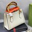 VIP GIFT 】หนังแท้ GUCCI Diana mini tote bag กระเป๋างานหูไม้ไผ่สุดคลาสสิก ดีไซน์มาใหม่พร้อมเข็ดขัดหนังสีสะท้อนแสงประดับตรงหูกระเป๋า ขนาดมินิกำลังน่ารักเลยค่ะ วัสดุหนังแท้ อะไหล่ทอง งานสวยตั้งอยู่ทรง มีสายสะพายยาว 1เส้น สามารถปรับระดับได้-ถอดได้ งานเก๋ไก๋ที