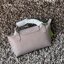 LONGCHAMP LE PLIAGE CITY POUCH WITH HANDLE Taupe - Canvas (ไม่มีสายยาว) กระเป๋าเครื่องสำอางแบบมีซิปพร้อมหูหิ้วใบนี้เหมาะสำหรับการจัดระเบียบกระเป๋าของคุณ