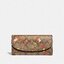 OUTLET 】COACH F31562 SLIM ENVELOPE WALLET IN SIGNATURE CANVAS WITH CHERRY PRINT คอลเลคชั่นใหม่ล่าสุด ต้อนรับนิวเยียร์ไปเลย!! 🍒🎊 กระเป๋าสตางค์รุ่นขายดี ทรงจดหมายรุ่นฝาพับ ดีไซน์ลายเชอร์รี่ น่ารักสดใส วัสดุหนังแคนวาสเคลือบลาย ภายในใส่มือถือไ
