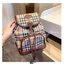 Burberry Small Beige Coated Canvas Backpack ไม่ว่าจะวันธรรมดาหรือวันไปเที่ยว เพียงแค่สะพายกระเป๋าเป้ใบนี้ติดตัวไปด้วย ก็เพิ่มความมีสไตล์ให้กับตัวเองได้แล้ว ด้วยรูปทรงและลายตารางอันเป็นสัญลักษณ์ของแบรนด์ สวยและแลดูคลาสสิค ด้วยความที่เป็นแบบสะพายกับไหล่ทั้ง