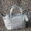 Longchamp Le Pliage Cuir Top handle bag S เรียกว่าเป็นกระเป๋าอีกหนึ่งรุ่นที่ไม่ว่ายังไงก็ฮอตฮิตและติดเทรนด์ตลอดไม่เคยเปลี่ยนกับ ทรง Le Pliage Cuir หนึ่งในตระกูลกระเป๋าสุดไอคอนิกจากแบรนด์