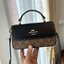 Coach Mini Josie Top Handle Crossbody In Blocked Signature Canvas (cc340) ใหม่ล่าสุด กระเป๋าสะพายหรือถือใบเล็กกระทัดรัด วัสดุหนังตัดขอบหนังแท้ ภายในช่องโล่งกว้างสามารถใส่โทรศัพท์ iPhonePro max ได้ มีช่องใส่บัตรเครดิต 2 ช่อง เปิดปิดด้วนกระดุมแป๊ก ซับในผ้า 