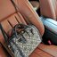 TORY BURCH FACTORY MONOGRAM JACQUARD BOSTON BAG กระเป๋าถือหรือสะพายรุ่นใหม่ล่าสุดจาก TORY BURCH FACTORY วัสดุ Woven Jacquard & Leather ในลาย Jacquard คงเอกลักษณ์แบรนด์สวยอยู่ทรงดีไซน์โดดเด่นทรง Boston เปิดปิดด้วยซิปคู่สะดวกใช้ขนาดกำลังดีใส่กระเป๋าสตางค์ยา