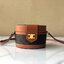 CELINE MEDIUM TAMBOUR IN SMOOTH CALFSKIN BAG กระเป๋าทรงกลมสวยหรูอยู่ทรงเปิดปิดด้วยฝาปิดกระดุมโลโก้แบรนด์ ภายในโล่ง