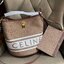 Celine Bucket Bag In Textile with Celine Logo สาว ๆ คนไหนกำลังมองหากระเป๋าสะพายที่สามารถจุของได้แบบกำลังพอดี เราขอแนะนำเป็นใบนี้เลยค่ะ เพราะมีขนาดที่ไม่เล็กและไม่ใหญ่จนเกินไป ให้ความคล่องตัวสูง มีฐานกว้างสามารถใช้สะพายไหล่เมื่อต้องการออกงานทางการหรือจะสะพ