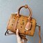 M.C.M ESSENTIAL BOSTON BAG IN VISETOS กระเป๋าถือ/สะพายข้าง ทรงหมอน สวยโดดเด่น ทรงสวยยอดนิยม มาพร้อมพวงหนังห้อย และสายรัดเก็บหูจับ วัสดุหนังแคนวาสคุณภาพดี เปิด-ปิดด้วยซิป ภายในเป็นหนังกลับ โล่งกว้าง ใส่ของได้เยอะ กระเป๋าสตางค์ โทรศัพท์ ของจุกจิกต่างๆ สบาย!