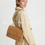 TORY BURCH KIRA CHEVRON CONVERTIBLE SHOULDER BAG กระเป๋าสะพายรุ่นยอดฮิต ไซส์ใหญ่จัดเต็มให้เน้นๆ ใช้ยังไงก็ดูหรู ดีไซน์เฉพาะตัว วัสดุหนังแกะ สัมผัสนิ่ม เปิด-ปิดด้วยกระดุมแม่เหล็ก ภายในเป็นช่องโล่ง แบ่งสัดส่วนไว้ดีมากๆ ใส่กระเป๋าสตางค์ มือถือ เครื่องสำอางค์