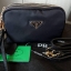 Prada 3 zipper mini crossbody bag งาน premium gift จาก counter ต่างประเทศค่ะ วัสดุ ผ้า nylon ตามแบบฉบับของแบรนด์เลย มาพร้อมกับสาย 2 เส้น มีสายหนังคล้องข้อมมือ และสายยาวสำหรับสะพายไหล่ หรือ crossbody ค่ะ ขนาดกำลังน่ารัก อะไหล่ทองดูหรู ภายใน มีช่องซิปแบ่ง 3