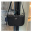 Prada Nylon Crossbody Bag กระเป๋าผ้าไนล่อน ตามแบบฉบับของแบรนด์ เลิศมาก สะพายเป็น shoulder bag หรือ Crossbody ก็ได้คะ ขนาดกำลังดีคะ ตัวกระเป๋าเบามาก เปิดปิดด้วยซิปรูดด้านมีช่องซิปแยกใส่ของ สามารถใส่มือถือได้ทุกรุ่น