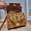 M.C.M MINI HERITAGE SATCHEL IN VISETOS **รอบราคาพิเศษต่ำกว่าทุน** รุ่นหายาก กลับมาให้จับจองกันแล้วจ้า กระเป๋าถือ/สะพายทรงสวยสุดแซ่บ มีดีเทลความงามมากมายในหนึ่งเดียว ความพิเศษคือตัวล็อคกุญแจและพวงหนังห้อยสุดหรู