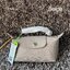 LONGCHAMP LE PLIAGE CITY POUCH WITH HANDLE Taupe - Canvas (ไม่มีสายยาว) กระเป๋าเครื่องสำอางแบบมีซิปพร้อมหูหิ้วใบนี้เหมาะสำหรับการจัดระเบียบกระเป๋าของคุณ