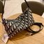 Medium DiorTravel Nomad Pouch Blue Dior Oblique Jacquard / DIOR AMBER MEDIUM BUCKET BAG กระเป๋าถือทรงพอช หรูหรามีสไตส์เป็นเอกลักษณ์
