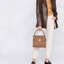 Tory burch lee radziwill pebbled small double bag กระเป๋า Lee Radziwill Double Bag สุดหรู ที่คำนึงถึงการเลเยอร์หนังและหนังกลับอย่างประณีตลงไปในงานดีไซน์ สามารถปรับปากกระเป๋าได้ 3 แบบตามต้องการ พร้อมนำเอาความเป็น American Luxury มาตีความใหม่ผ่านแง่มุมของคว
