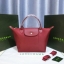 Longchamp Size S สินค้าใหม่ ของแท้!! เป็นล็อตผลิตเกินออเดอร์จากโรงงาน มาพร้อมการ์ด/ถุงผ้าแบรนด์/ถุงกระดาษแบรนด์ Size S: 25 x H. 23 x 16 cm. Color: Wine 609