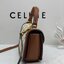 CELINE Mini besace triomphe in shiny top handle กระเป๋าสะพายคาดลำตัวพร้อมหูจับถนัดมือ ได้รับความนิยมอย่างมาก ด้วยรูปร่างทรงโค้งมนมีความคลาสสิกตามแบบฉบับแบรนด์