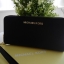 Best seller! งานขายดี รุ่นใหม่คะ Michael kors saffiano Wallet กระเป๋าสตางค์ใบยาว หนัง Saffiano ซิปรอบ สวยหรู มาก อะไหล่ปั้มโลโก้แบรนด์ ด้านในมีช่องใส่บัตร เยอะม้ากกก อีกด้านมีช่องแบงค์+ซิปใส่เหรียญ จุของได้เยอะจริงๆคะ ใส่ iphone 6+ ได้ สวยหรูดูดี อุปกรณ์ค