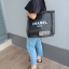 สาวๆ style minimal ห้ามพลาด! Chanel Black Mesh Tote Bag กระเป๋าแบรนด์ชาแนล ของแท้ (ไม่ใช่งานเลียนแบบ) ทำจาก 100% Polyester Mesh ใบขนาดพอดี รุ่นนี้ตัวสายทำจากผ้า ด้านหน้าสกรีนชื่อแบรนด์ น้ำหนักเบา สะพายไหล่ได้ ดีไซน์เก๋ ใส่หนังสือ ใส่แฟ้มเอกสาร ipad ได้สบา