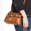 M.C.M Heritage Visetos Coated Canvas Satchel คอลเลคชั่นใหม่ล่าสุด ดีไซน์ไซส์กะทัดรัด เหมาะกับการเก็บของสำคัญของสาวๆ ได้อย่างมั่นใจ สะพายได้แบบคล่องตัว กระเป๋าสะพายข้าง ตัวกระเป๋าเป็นหนังแคนวาสคุณภาพ ภายในเป็นช่องโล่ง สาวๆได้พกพาใบนี้ไปทำกิจกรรมได้ตามสะดวก