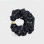 Celine Scrunchy Rayure Bracelet in Brass / CELINE BRACELET WITH TRIOMPHE GOLD AND SILK ที่รัดผมที่ไม่ใช่เพียงรัดผมแต่เป็นเครื่องประดับในสไตล์สาว LISA ที่ต้องอยู่ที่ข้อมือเท่านั้น! จนถือเป็นซิกเนเจอร์ที่โดดเด่นจนแฟนๆทั่วโลกต้องจดจำ วัสดุทอจากไหมทั้งเส้นลาย