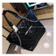 CHANEL Tote Leather Bag ต้อนรับเทศกาลท่องเที่ยวช่วงปีใหม่นี้ ใครมองหากระเป๋าสะพายไปเที่ยว ใบนี้น้องตอบโจทย์แน่นอน กับกระเป๋าทรงโท้ทสีดำคลาสสิก ดีไซน์โทนสีที่ใช้ได้กับทุกโอกาส