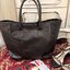 Givenchy Black Soft Leather Shoulder Handbags (Limited edition) กระเป๋าถือหรือสะพายพรีเมี่ยมของเเท้จาก "Givenchy Perfume Counter" วัสดุหนังนิ่มเรียบสีดำด้านหน้าปั้มโลโก้แบรนด์ GV ภายใน Polyester 100% สีดำสกรีนโลโก้สวยดูดี เปิดปิดด้วยกระดุมแม่เหล