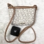 CALVIN KIEIN MINI CROSSBODY BAG สินค้าเข้าใหม่น่าใช้ค่ะ กระเป๋าสะพาย วัสดุหนังลายแบรนด์ทั้งใบ ด้านหน้าติดโลโก้แบรนด์อะไหล่ทอง เปิดปิดกระเป๋าแบบซิป ภายในโล่ง ใส่ของจุ สามารถใส่ธนบัตร สมุดแบงค์ มือถือรุ่นต่างๆ เครื่องสำอางค์ กระเป๋าสตางค์ใบสั้น บอกเลยจุค่ะ 
