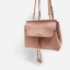 CHARLES & KEITH TASSEL DETAIL SLING BAG กระเป๋าสะพายทรงสวย ที่ฝาพับด้านหน้าแต่งหนังตัดกับหนังกลับสวยงาม สะพายได้ทั้งแบบเป้ และสะพายข้างก็เก๋ไปอีกแบบ มีโซ่เหล็กห่วงห้อยตุ้งติ้งน่ารัก จุของได้เยอะ พร้อมปั๊มโลโก้แบรนด์สีทองเด่น ภายในมีช่องแบ่งใหญ่ใส่ iPhone 