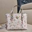 COACH C8612 MOLLIE TOTE 25 IN SIGNATURE CANVAS WITH MYSTICAL FLORAL PRINT คอลใหม่ล่าสุด ยังไม่เข้า shop ไทย สวยๆแบบไม่ต้องรอพรีฯให้ยาวนาน กับกระเป๋าโท้ทไซส์เล็กที่สาวๆต่างก็ต้องปักใจรัก สวยสมใจ ดีไซน์ลวดลายดอกไม้ คละเคล้าเต็มใบ ดูละมุน สดใส น่าใช้สุดๆ วัส