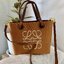 Loewe Anagram leather canvas tote bag / Loewe Tote Bag กระเป๋าโท้ทน้องใหม่ วัสดุทำจากหนังแคนวาส ใช้งานทนทาน ออกแบบมีสายสะพายไหล่และหูหิ้ว เรียกว่าใช้งานได้แบบ 2 in1 งานสวยล้ำ ไม่ซ้ำใคร ปักโลโก้ Anagram ที่ด้านหน้า เปิด-ปิดด้านบนด้วยเชือกผูก ด้านในมีช่องสำ