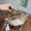 Medium : Tory Burch T Monogram Embossed Bucket Bag กระเป๋าถือหรือสะพายไหล่ ประดับด้วยลวดลายอันเป็นสัญลักษณ์ของแบรนด์ ถูกประดิษขึ้นด้วยความพิถีพิถันวัสดุหนังอย่างดี ด้านในบุด้วยหนังไมโครซูแอคเนื้อนุ่มทำความสะอาดง่าย กระเป๋าผ่าหลังด้านนอก1ช่อง ด้านใน 1ช่อง 