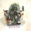 GUESS DELANEY MINI CROSS BODY BAG กระเป๋าถือหรือสะพายรุ่นที่ฮิตและขายดีที่สุดจาก GUESS FACTORY หนัง Saffiano ลาย GUESS ดอกไม้ และ ลายหัวใจ สวยอยู่ทรง ขนาดกำลังดี น้ำหนักเบา ด้านหน้าประดับโลโก้พร้อมพวงกุญแจโลโก้แบรนด์ห้อยที่หูกระเป๋าถอดเเยกใช้ได้ เปิดปิดด้