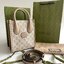 หนังแท้ GUCCI Mini tote bag with Interlocking G พร้อมส่งที่ไทย Beige and white GG Supreme canvas เกรดออริจินอล ภาพสินค้าถ่ายจากงานขายจริง ใช้งานต่างประเทศได้ The mini tote bag is complete with an oatmeal leather trim and an Interlocking G tag.