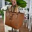 OUTLET 】TORY MCGRAW SMALL DRAWSTRING กระเป๋าถือหรือสะพายข้าง วัสดุหนังวัวแท้ อะไหล่ทอง เปิด-ปิดด้วยสายหนังรูด จะถือหรือสะพายข้างได้Crossbodyได้ น้ำหนักเบาจุของได้เยอะ ด้านหน้าประดับโลโก้แบรนด์ ด้านในมีช่องเล็กสำหรับใส่บัตรใส่ตังค์ได้ มีสายยาว ปรับสายได้ ถ